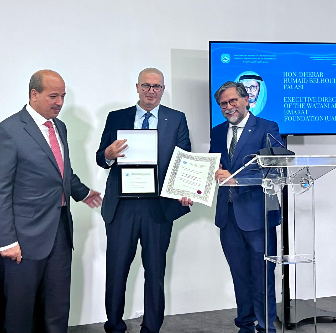 The Parliamentary Assembly of the Mediterranean honors the Executive Director of Watani Al Emarat Foundation in the "Best Youth Support Program" Category