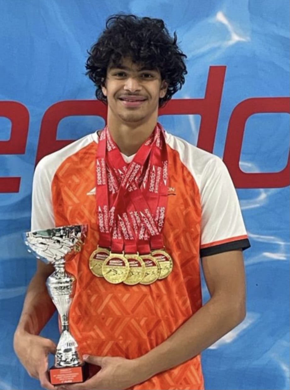 UAE Swimmer Hussein Shawky Makes History with Gold and Silver at Asian Age Group Championships